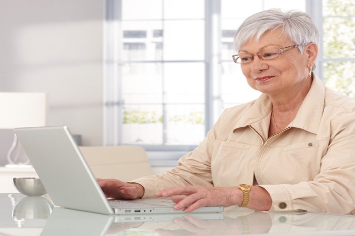 grandmother-using-laptop-at-home-3